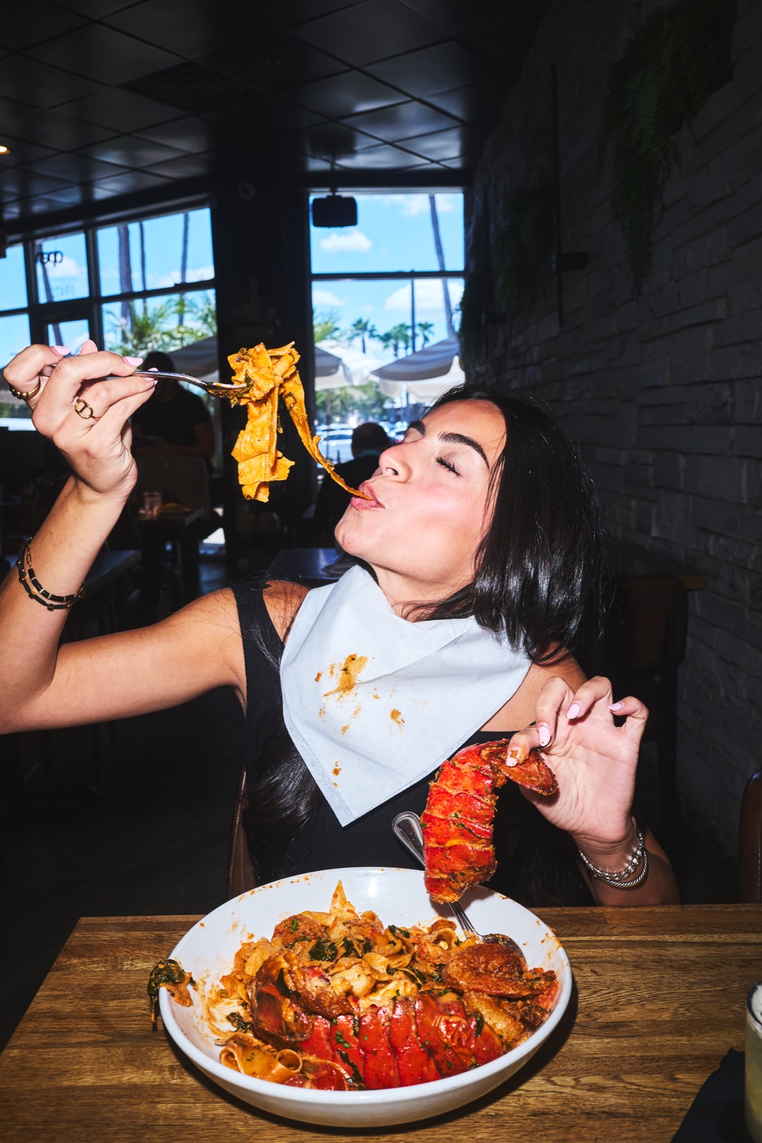 Guest enjoying lobster and pappardelle